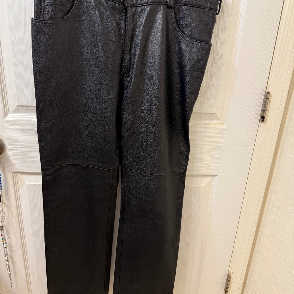 Size 40 genuine black leather biker pants by Reed. Like New